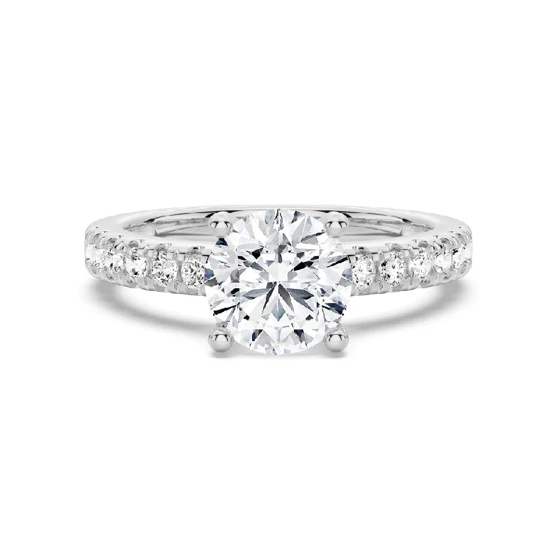 Round Moissanite Engagement Ring With Split Prong Side Accents