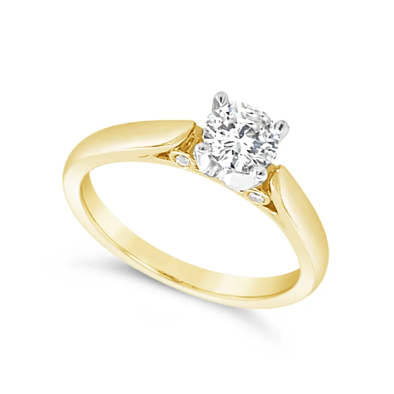 Round Diamond and Diamond Accented Engagement Ring